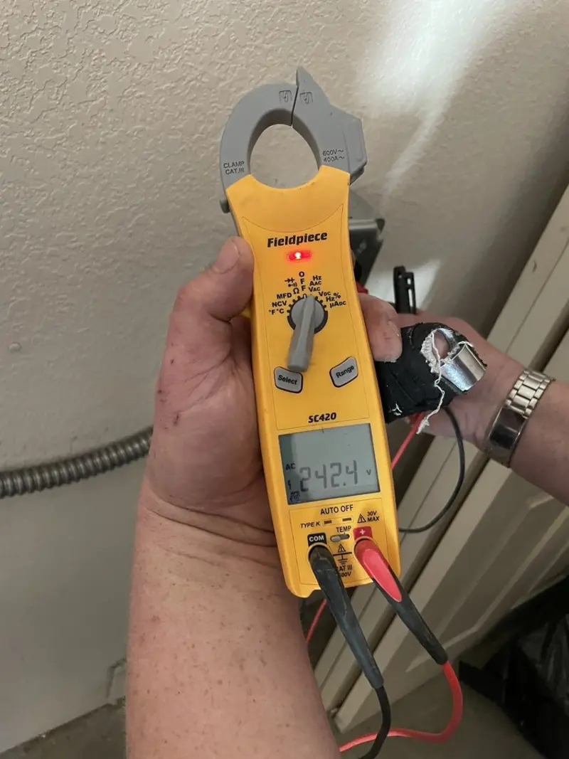 Voltage testing with clamp meter during Electrical Installation Services in Castroville